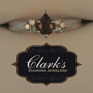 Clarks Diamond Jewelers - Platinum Color Change Garnet and Diamond Ring