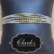 Clarks Diamond Jewelers - Five Separate Brass Cube Slipknot Bracelets Cream